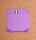 Sticky note on a bulletin board Royalty Free Stock Photo