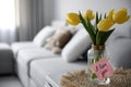 Sticky note with handwritten message I Love You attached to vase in living room, space for text Royalty Free Stock Photo