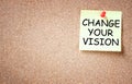 Sticky note with the phrase change your vision, room for text Royalty Free Stock Photo