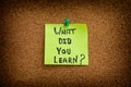 A sticky note with the question what did you learn written on it