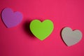 Sticky note shaped a heart symbol on pink background Royalty Free Stock Photo