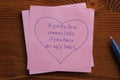 Sticky note with text A face means little,if you have an ugly hea