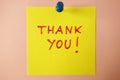 Sticky note with text Thank you on pink background Royalty Free Stock Photo