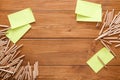 Sticky notes and color pencils on wooden desk Royalty Free Stock Photo