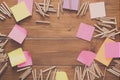 Sticky notes and color pencils on wooden desk Royalty Free Stock Photo