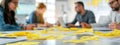 Sticky notes cover a workspace, hinting at a flurry of ideas in brainstorming session