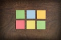 Sticky notes on wooden background Royalty Free Stock Photo