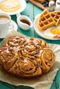 Sticky pecan buns on breakfast table Royalty Free Stock Photo