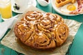 Sticky pecan buns on breakfast table Royalty Free Stock Photo