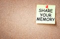 Sticky pinned to cork board with the phrase share your memory