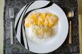 Sticky rice with mangoes with coconut milke on top