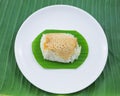 Sticky rice with steamed custard on banana leaves and dish Royalty Free Stock Photo