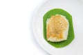 Sticky rice with steamed custard on banana leaves and dish Royalty Free Stock Photo
