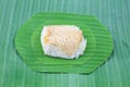 Sticky rice with steamed custard on banana leaves, sweet sticky rice, Thai sweet dessert, Royalty Free Stock Photo