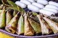 Sticky rice wrapped with banana leaf and banana grilling on stove Royalty Free Stock Photo