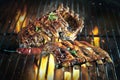 Sticky spicy marinated pork ribs grilling on a BBQ Royalty Free Stock Photo