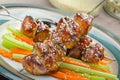 Sticky teriyaki chicken skewers with crunchy slaw