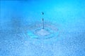 Stiffened water drop falling on a water surface Royalty Free Stock Photo