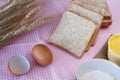 Stiil life with whole wheat bread,egg,magarine,flour and wheat o Royalty Free Stock Photo