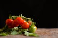 Stil life group of tomato on old wood Royalty Free Stock Photo