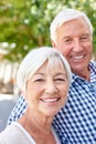 Still happily married after all these years. a happy senior couple standing together outside. Royalty Free Stock Photo