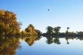 Still Lake With Balloon Above Royalty Free Stock Photo