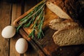 Still life. Agricultural products: eggs, milk, fresh bread on a wooden table. Close-up One trick Royalty Free Stock Photo