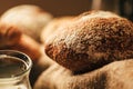 Still life. Agricultural products: eggs, milk, fresh bread on a wooden table. Close-up One trick Royalty Free Stock Photo