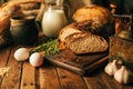 Still life. Agricultural products: eggs, milk, fresh bread on a wooden table. Close-up One trick Royalty Free Stock Photo