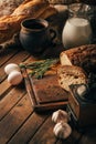 Still life. Agricultural products: eggs, milk, fresh bread on a wooden table. Close-up One trick Royalty Free Stock Photo