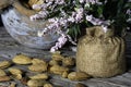 Still life. Almond nuts in a clay pot on a wooden table closeup