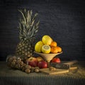 Still Life With Ananas And Walnuts Royalty Free Stock Photo