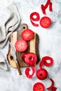 Still life with apples on wooden board over white marble table, top view. Fresh red apples Baya Marisa. Royalty Free Stock Photo