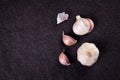 A still life arrangement of Three whole garlic bulbs grouped on Royalty Free Stock Photo