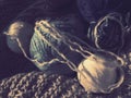 Still life of balls of yarn, woolen and acrylic threads, knitting needles, knitted products. Soft light from the window. Knitting Royalty Free Stock Photo