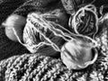 Still life of balls of yarn, woolen and acrylic threads, knitting needles, knitted products. Soft light from the window. Knitting Royalty Free Stock Photo