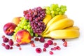 Still life with banana, grape, raspberry and nectarine on white