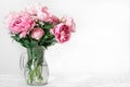 Still life with a beautiful bouquet of pink peony flowers. holiday or wedding background Royalty Free Stock Photo