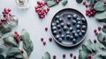 Still Life, Berries And Foliage On plate With A Winter Concept Royalty Free Stock Photo