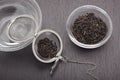 Still life with black tea leaves Royalty Free Stock Photo