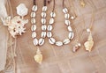 Bohemian summer jewelry with shells - cowrie shells necklaces - fashion jewelry advertisement Royalty Free Stock Photo
