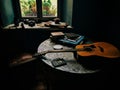 Still life with books and the guitar Royalty Free Stock Photo