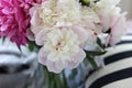 a still life with a bouquet of white and pink peonies Royalty Free Stock Photo