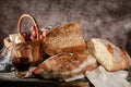 Still life bread in basket and bottle of wine Royalty Free Stock Photo