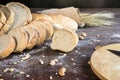 Still life with bread and wheat on wooden table Royalty Free Stock Photo