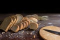 Still life with bread and wheat on wooden table Royalty Free Stock Photo