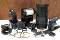 Still life with broken camera lens, flash, camera film, Cmos sen Royalty Free Stock Photo