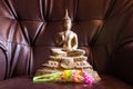 Still Life Buddha Statue With Garland