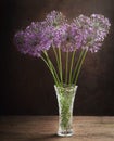 Still life with bunch of purple allium flowers or ornamental onion