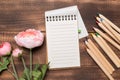 Still life, business, office supplies or education concept : Top view image of open notebook with blank pages on wood